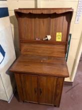Wooden cabinet with a detached top