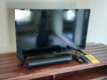 Small Toshiba Flatscreen TV w/ Fangor Sound Bar