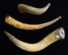 THREE UNIQUELY CARVED HORNS.