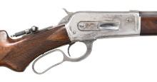 WINCHESTER MODEL 1886 DELUXE LEVER ACTION RIFLE.