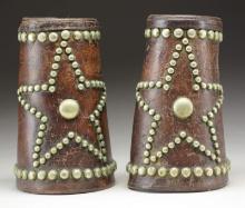 PAIR OF COWBOY STUDDED LEATHER CUFFS.