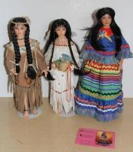 Three Native American-Style Porcelain Dolls on Stands