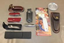 Two Folding Knives and Multi-Tool in Sheaths