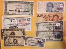 Nine mixed pieces of World Currency